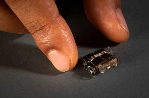 Researchers at the University of Washington have now created MilliMobile, a tiny, self-driving robot powered only by surrounding light or radio waves. It’s about the size of a penny and can run indefinitely on harvested energy.