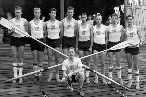 A black and white photo of the "Boys in the Boat" UW rowing team