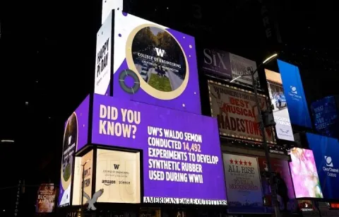 UW ad in a Times Square billboard